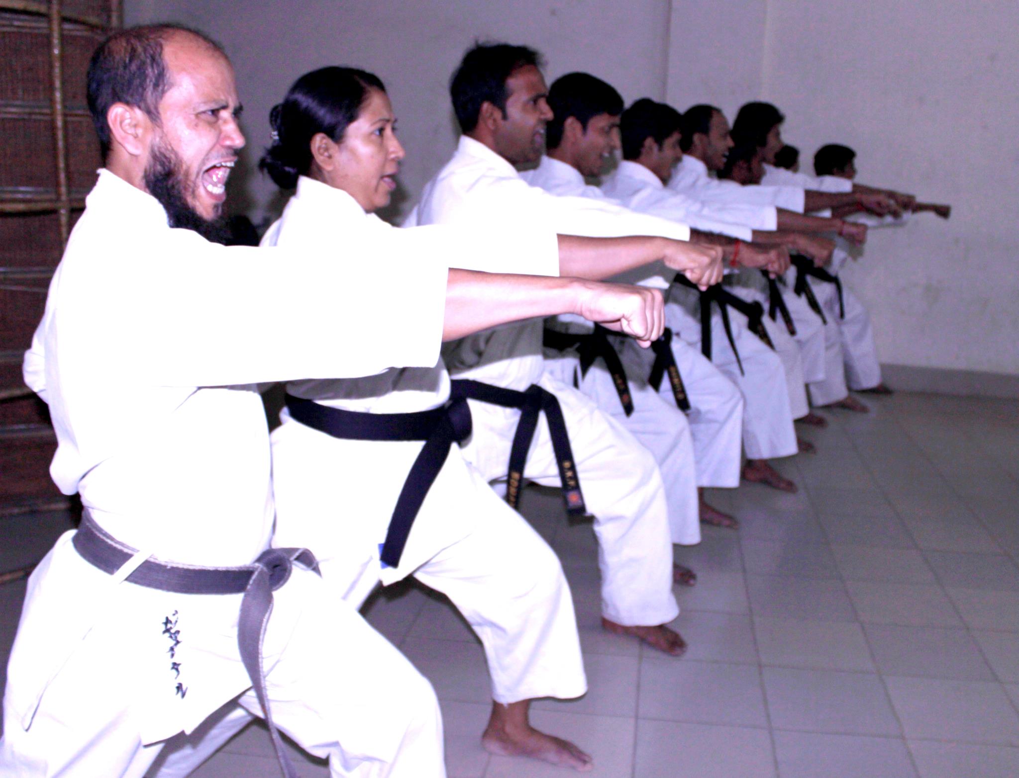 Group of students practicing punches